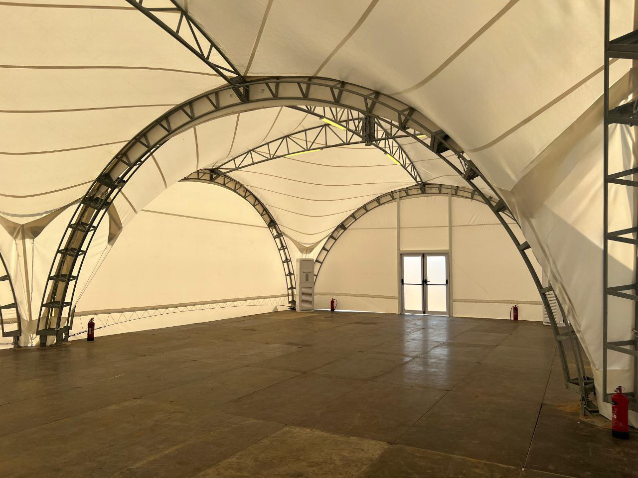 Tent structure detail with aluminium arch profiles, fasteners and PVC membrane