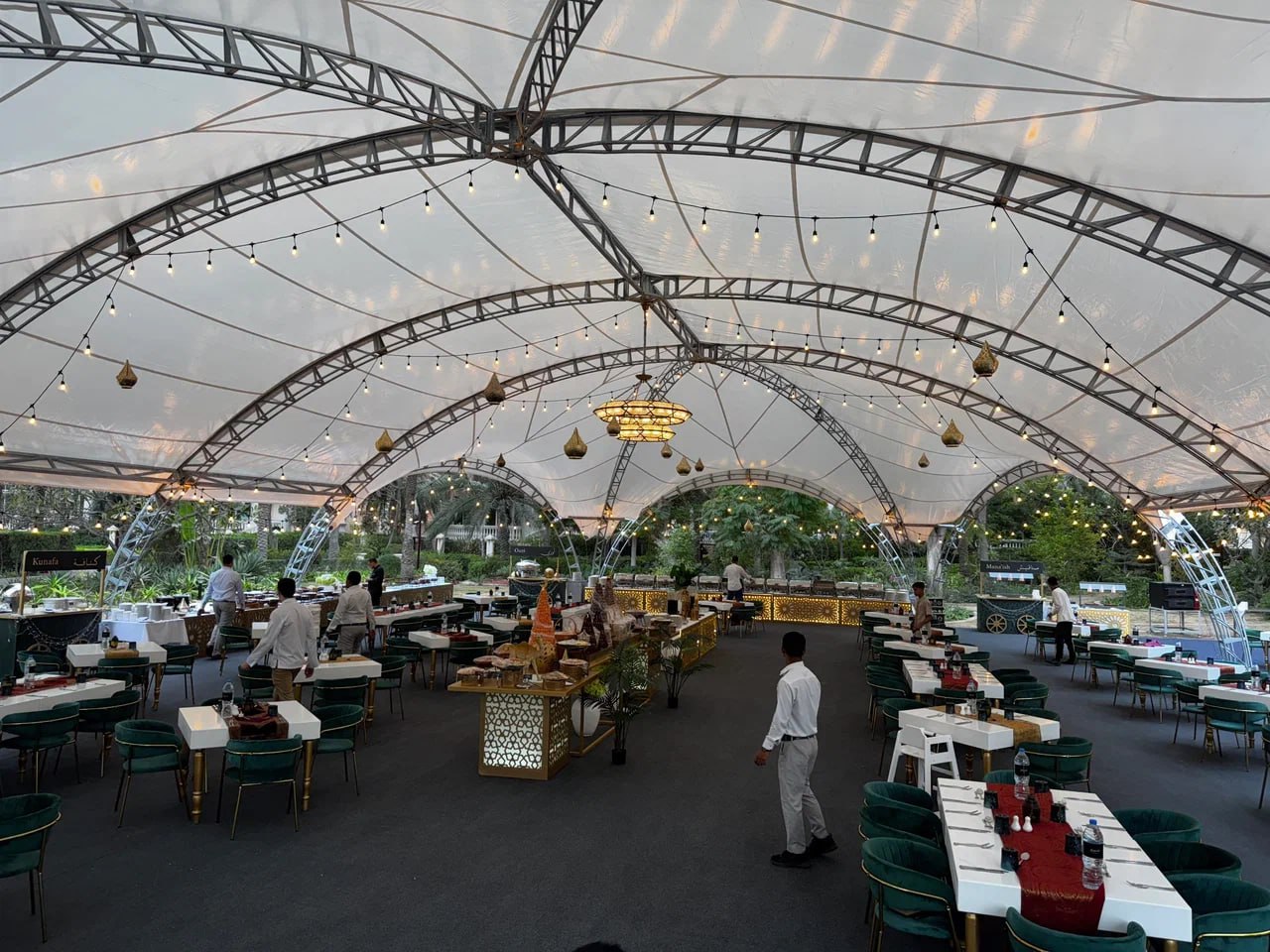 Beautiful decorated Ramadan marquee with traditional Arabic patterns and warm ambient lighting