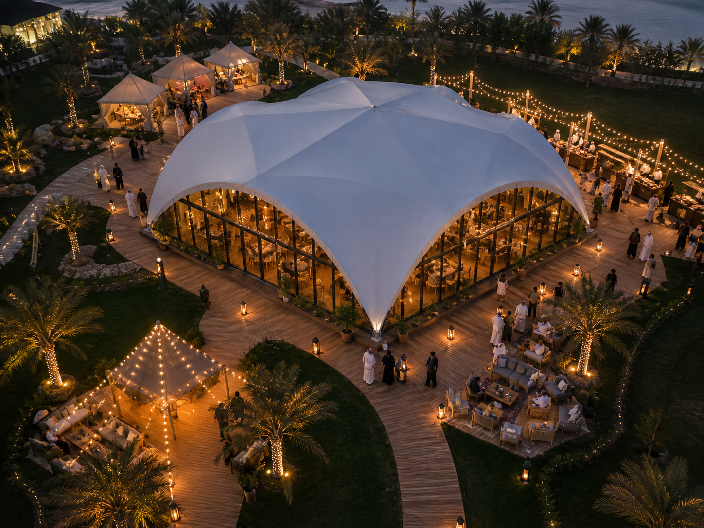 Traditional Ramadan tent in UAE with majlis seating, carpets, lanterns and warm lighting for iftar gatherings