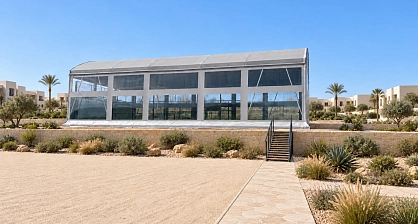 Covered padel court with transparent walls, exterior