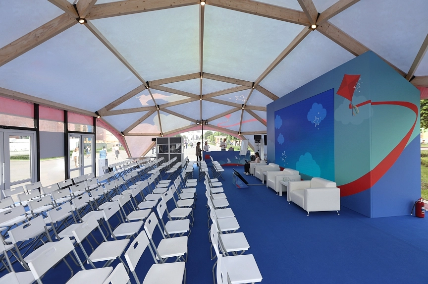 Interior of a wooden tent for a large-scale business event in Eastern Europe