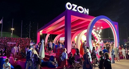 Night filming of branded structure for festival